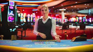 qq998 login mobile app interface showing live casino tables and sportsbook menus